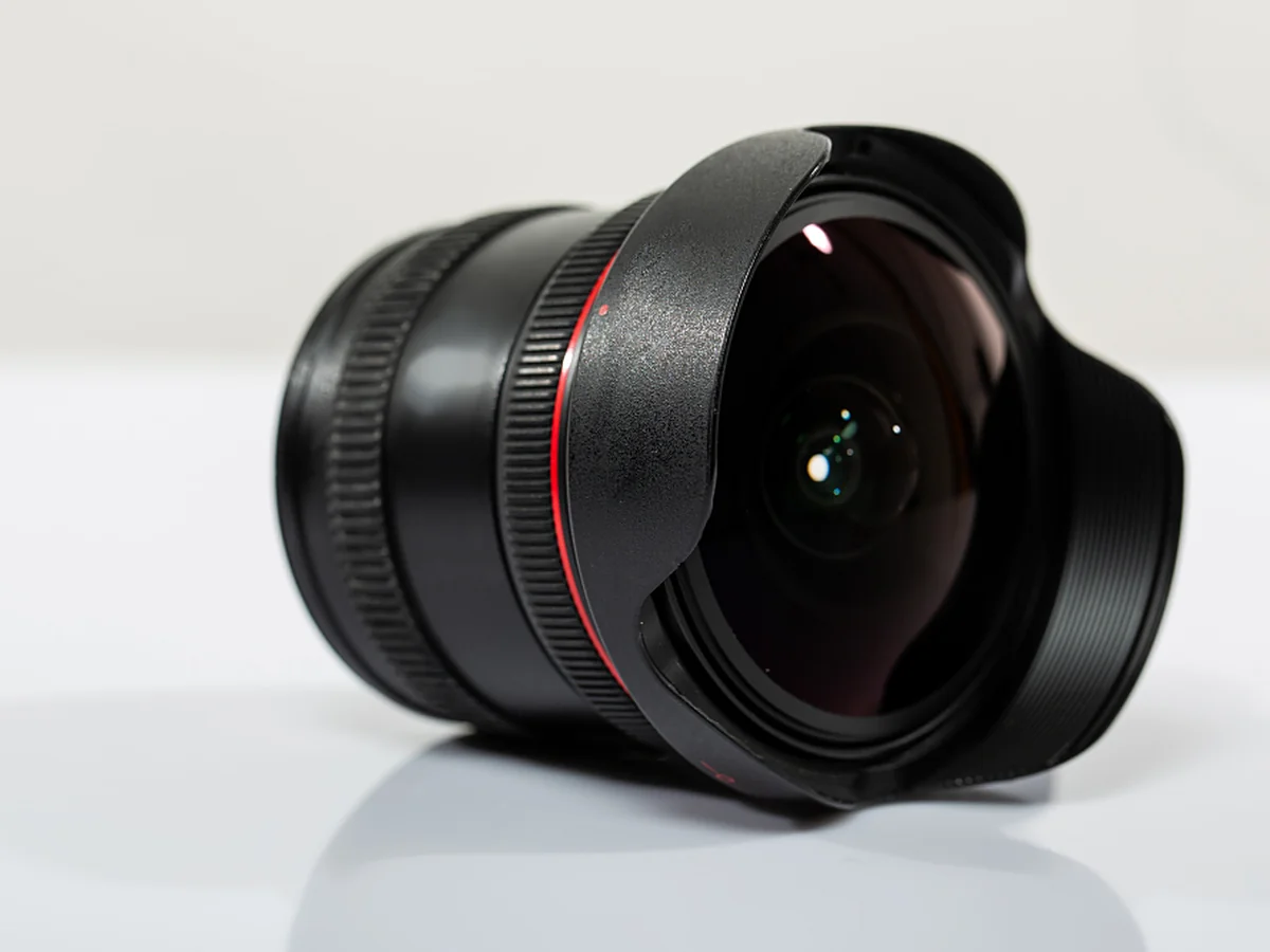 Wide-angle lens with red ring on a white surface